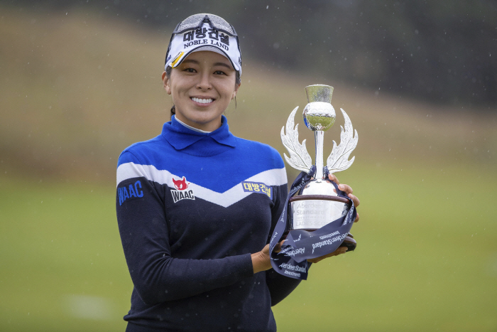 South Korea's Mi Jung Hur poses as she celebrates with the trophy after winning the Ladies Scottish ...