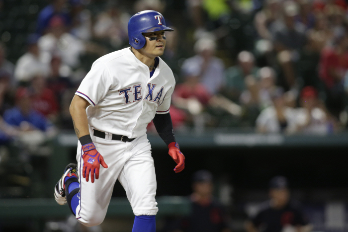 Jul 21, 2018; Arlington, TX, USA; Texas Rangers designated hitter Shin-Soo Choo (17) grounds into a ...