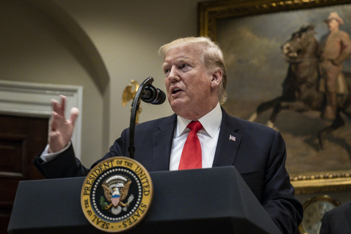 epa07817935 US President Donald J. Trump makes an announcement about state opioid response grants in...